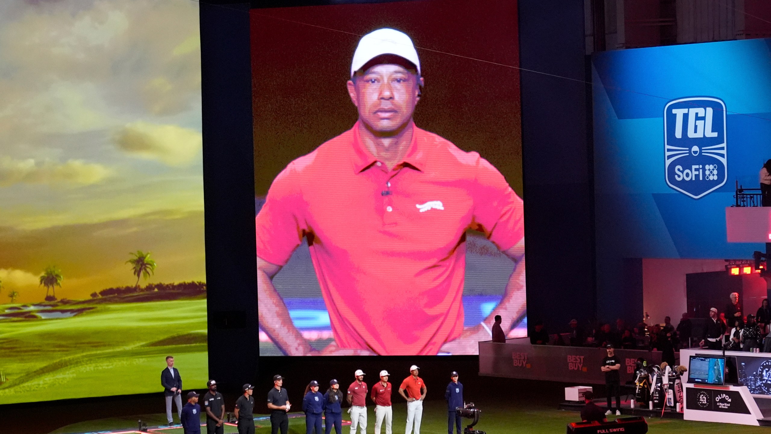 Tiger Woods is introduced before the start of Los Angeles Golf Club and his Jupiter Links Golf Club, Tuesday, Jan. 14, 2025, in Palm Beach Gardens, Fla. (AP Photo/Marta Lavandier)