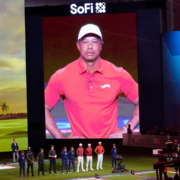 Tiger Woods is introduced before the start of Los Angeles Golf Club and his Jupiter Links Golf Club, Tuesday, Jan. 14, 2025, in Palm Beach Gardens, Fla. (AP Photo/Marta Lavandier)