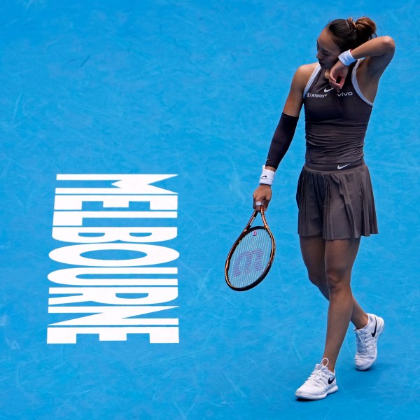 Zheng Qinwen of China reacts during her second round match against Laura Siegemund of Germany at the Australian Open tennis championship in Melbourne, Australia, Wednesday, Jan. 15, 2025. (AP Photo/Asanka Brendon Ratnayake)