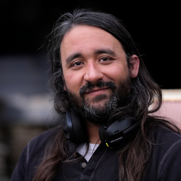 Steve Alejandro poses for a photo outside his home Wednesday, Dec. 18, 2024, in Wentzville, Mo. (AP Photo/Jeff Roberson)