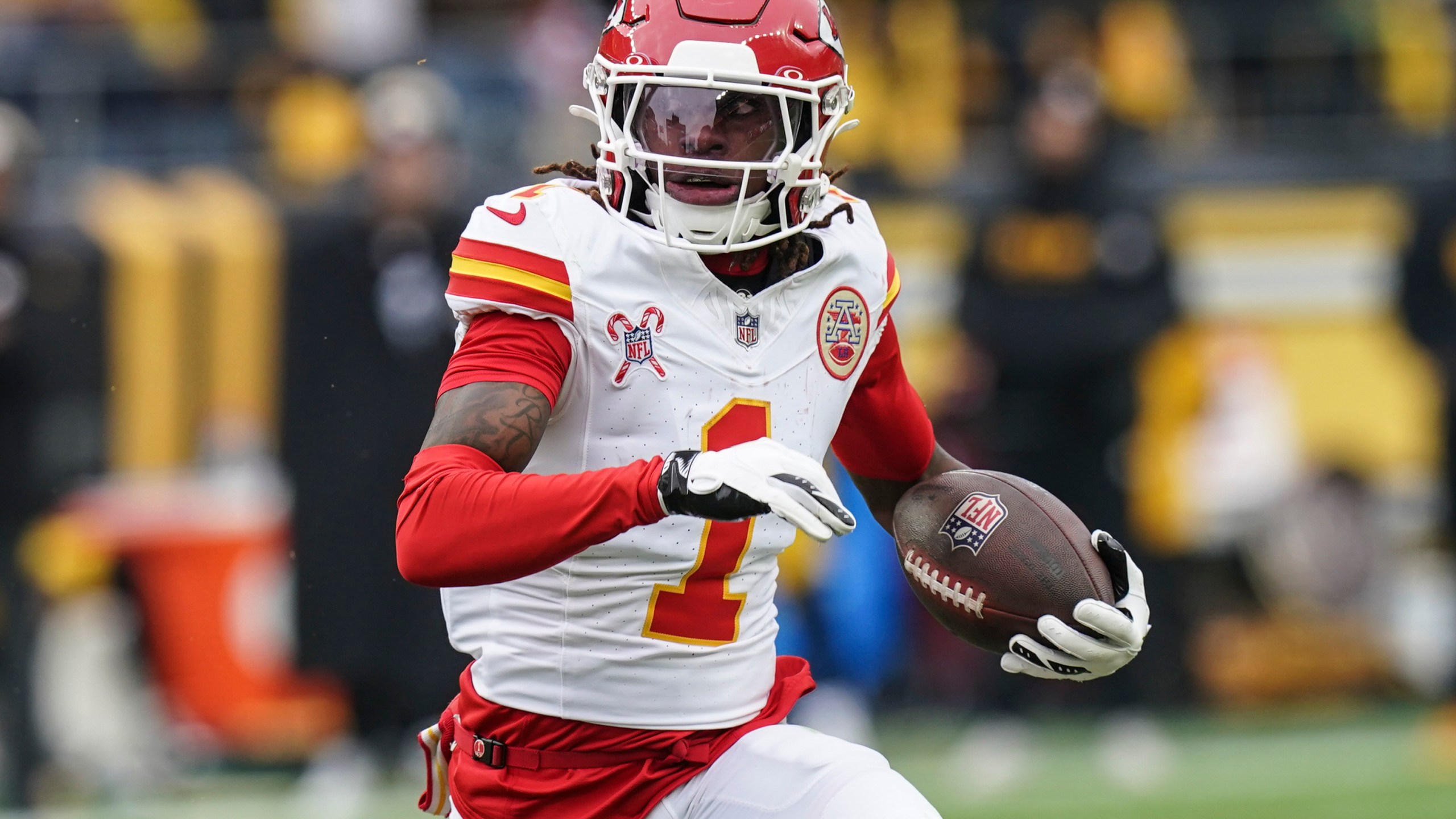 Kansas City Chiefs wide receiver Xavier Worthy (1) runs against the Pittsburgh Steelers during the first half of an NFL football game, Wednesday, Dec. 25, 2024, in Pittsburgh. (AP Photo/Matt Freed)