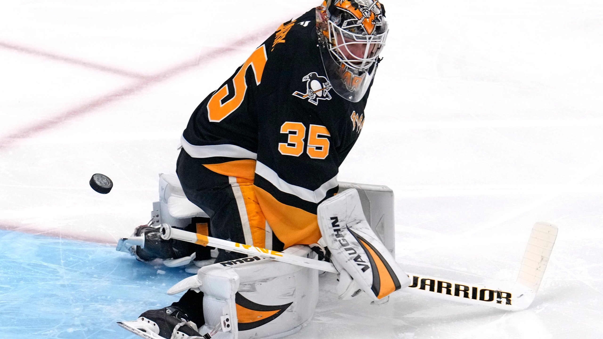 A shot by Seattle Kraken's Chandler Stephenson gets past Pittsburgh Penguins goaltender Tristan Jarry for a goal during the first period of an NHL hockey game in Pittsburgh, Tuesday, Jan. 14, 2025. (AP Photo/Gene J. Puskar)