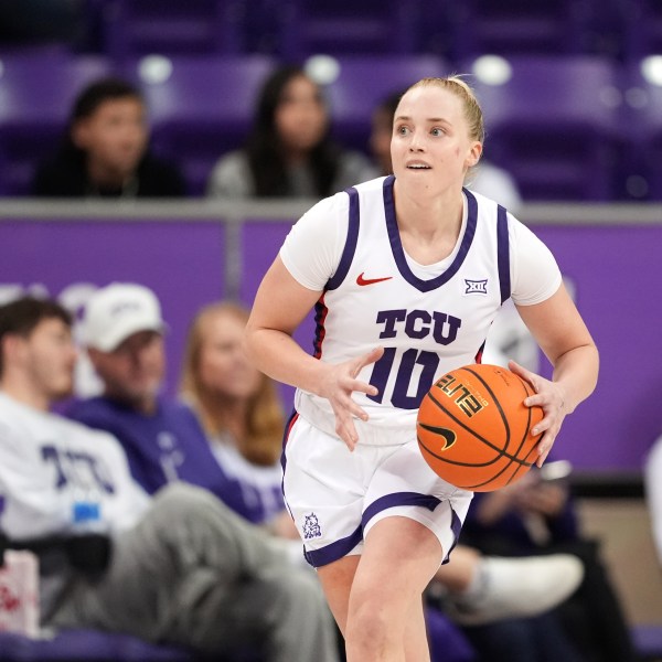 FILE - TCU guard Hailey Van Lith parepares to make a pass during an NCAA college basketball game against Louisiana Tech in Fort Worth, Texas, Sunday, Dec. 15, 2024. (AP Photo/Tony Gutierrez, File)