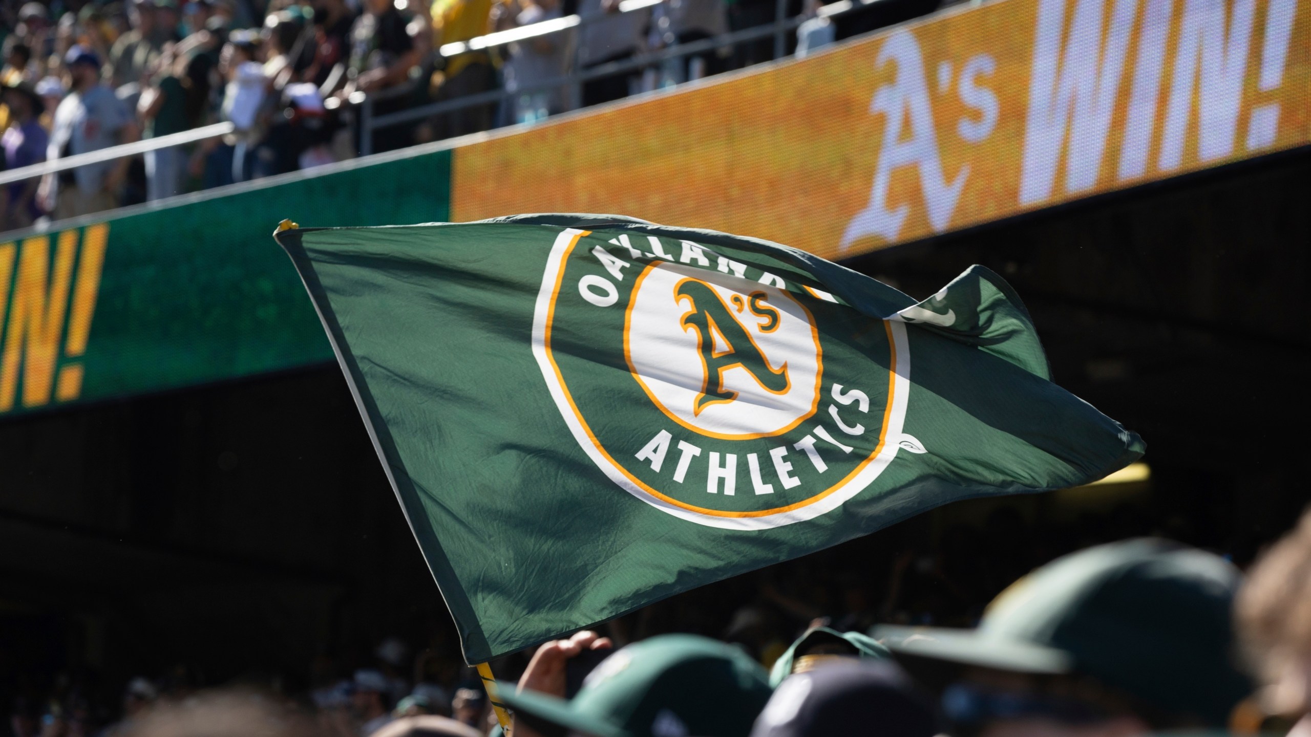 FILE - An Oakland Athletics flag is flown after a baseball game between the Athletics and the Texas Rangers, Thursday, Sept. 26, 2024, in Oakland, Calif. (AP Photo/Benjamin Fanjoy, File)