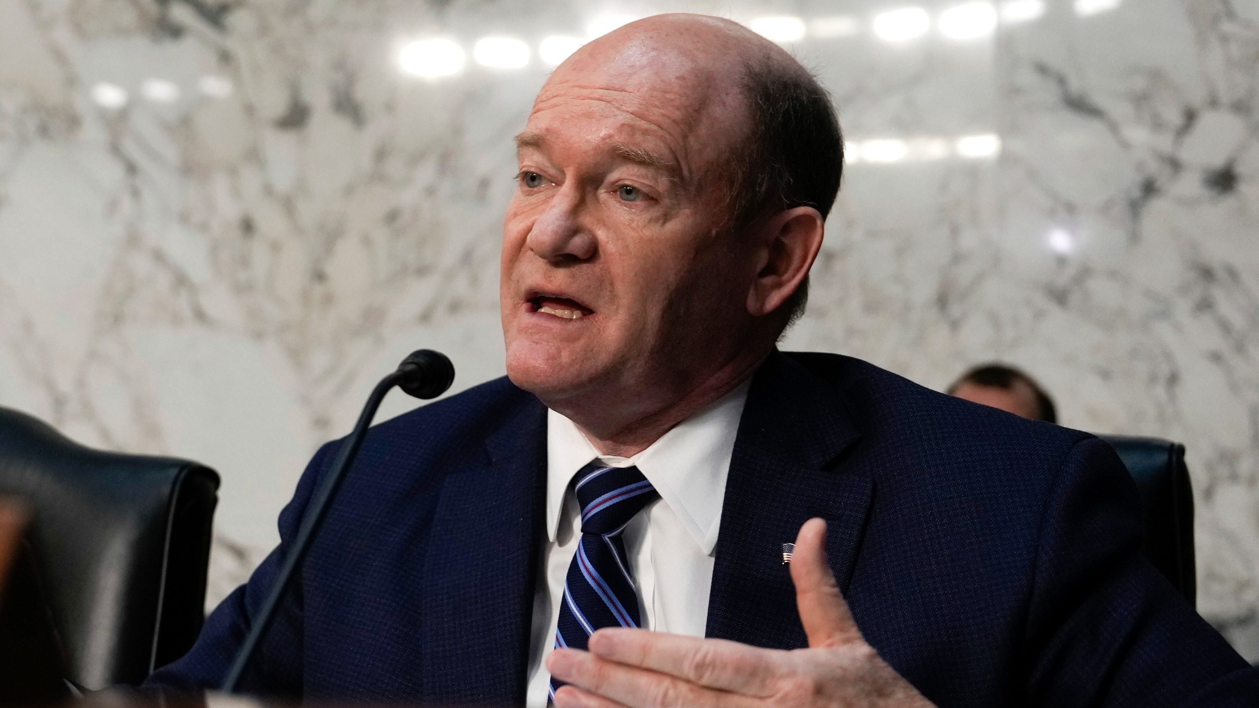 Sen. Chris Coons, D-Del., speaks at the Senate Judiciary Committee confirmation hearing for Pam Bondi, President-elect Donald Trump's choice to lead the Justice Department as attorney general, at the Capitol in Washington, Wednesday, Jan. 15, 2025. (AP Photo/Ben Curtis)