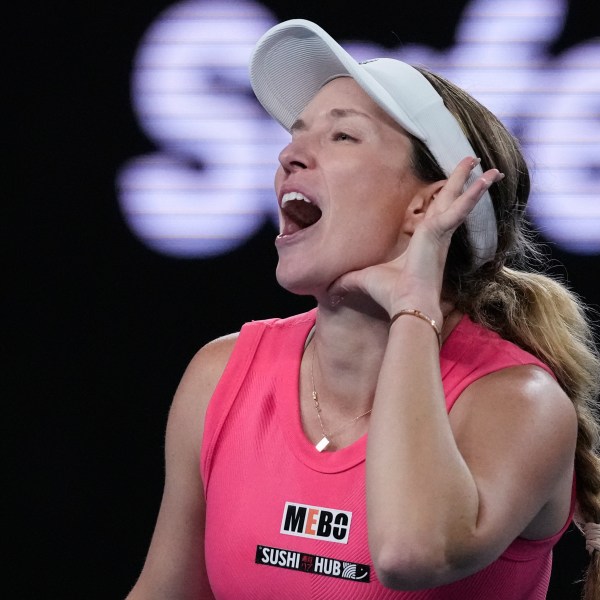 Danielle Collins of the U.S. reacts after defeating Destanee Aiava of Australia in their second round match at the Australian Open tennis championship in Melbourne, Australia, Thursday, Jan. 16, 2025. (AP Photo/Manish Swarup)