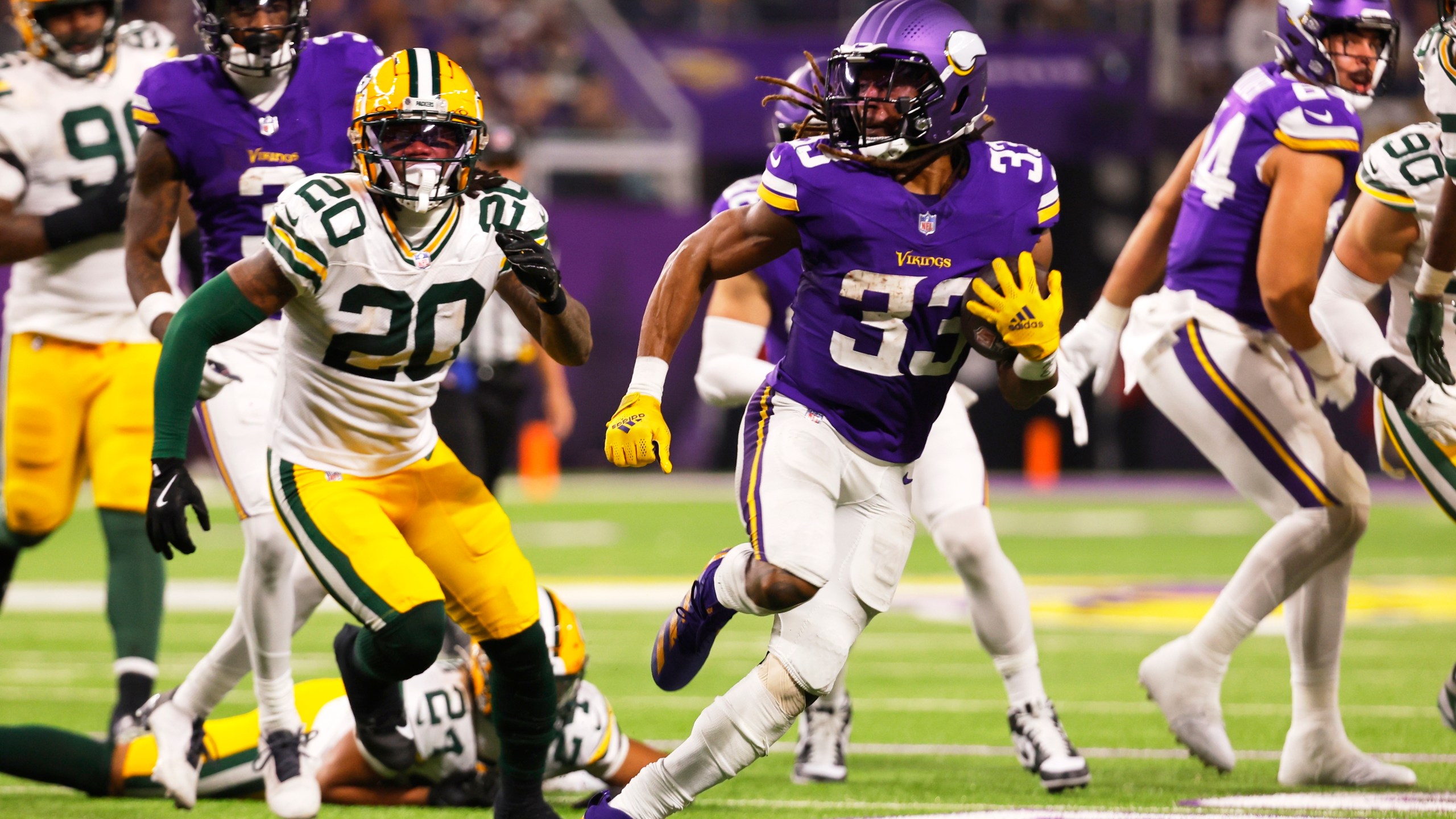 Minnesota Vikings' Aaron Jones runs during the second half of an NFL football game against the Green Bay Packers Sunday, Dec. 29, 2024, in Minneapolis. (AP Photo/Bruce Kluckhohn)