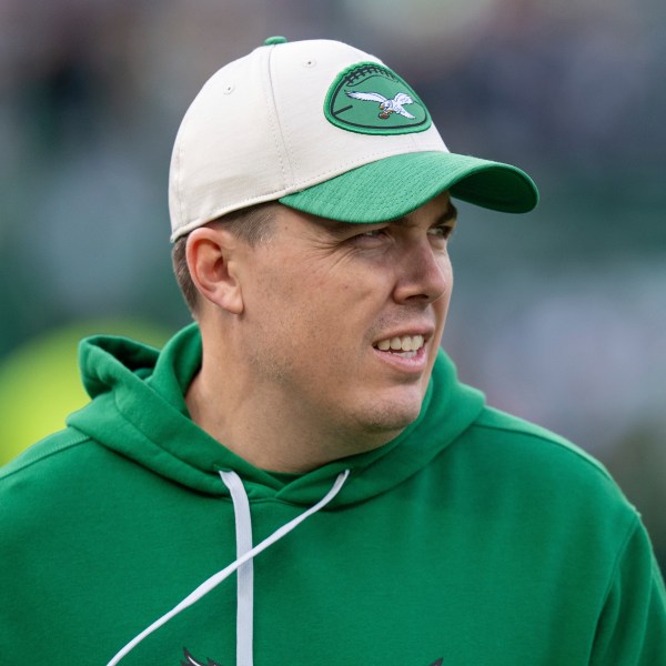 Philadelphia Eagle offensive coordinator Kellen Moore looks on during warm-ups prior to the NFL football game against the Dallas Cowboys, Dec. 29, 2024, in Philadelphia. (AP Photo/Chris Szagola)