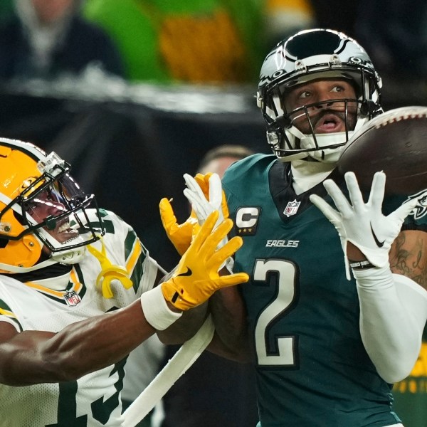 Philadelphia Eagles cornerback Darius Slay Jr. (2) intercepts a pass intended for Green Bay Packers wide receiver Dontayvion Wicks (13) during the first half of an NFL wild-card playoff football game Sunday, Jan. 12, 2025, in Philadelphia. (AP Photo/Matt Slocum)