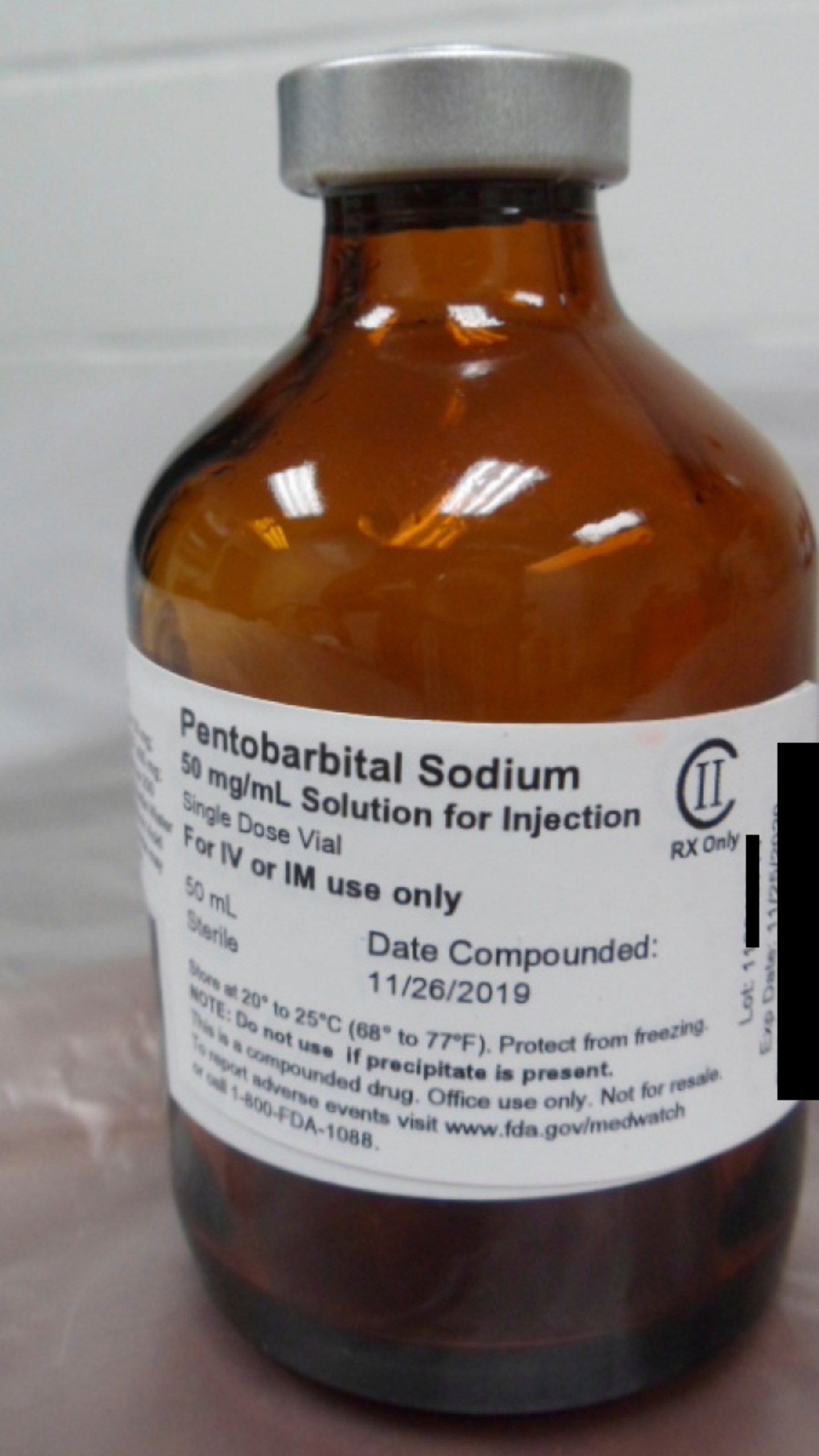 FILE - This photo provided by the U.S. Department of Justice shows a vial of pentobarbital used in the executions of two inmates in July 2020, according to court filings. (Department of Justice via AP, File)