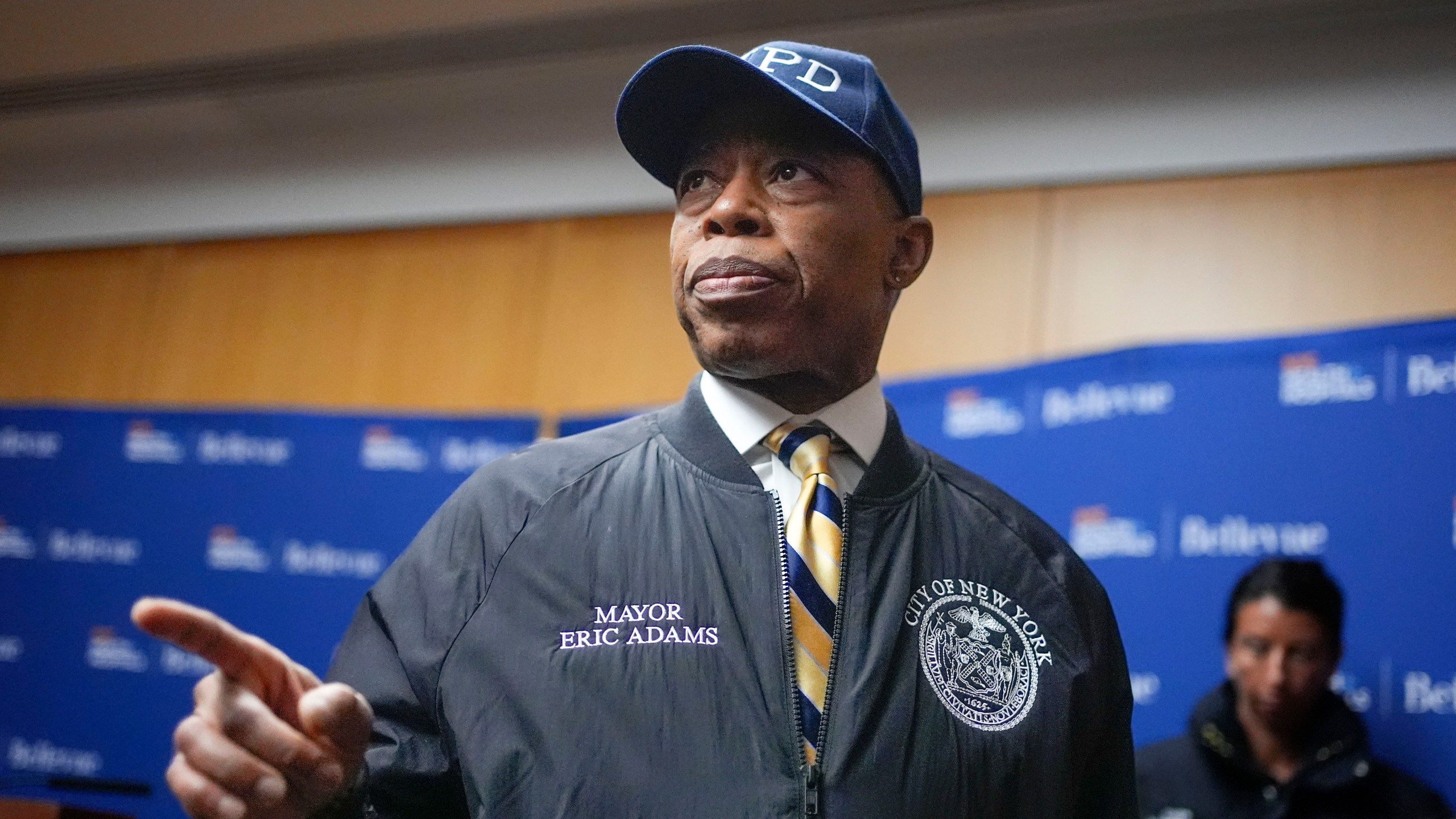 New York City mayor Eric Adams speaks to reporters as he leaves a news conference in New York, Tuesday, Feb. 18, 2025. (AP Photo/Seth Wenig)