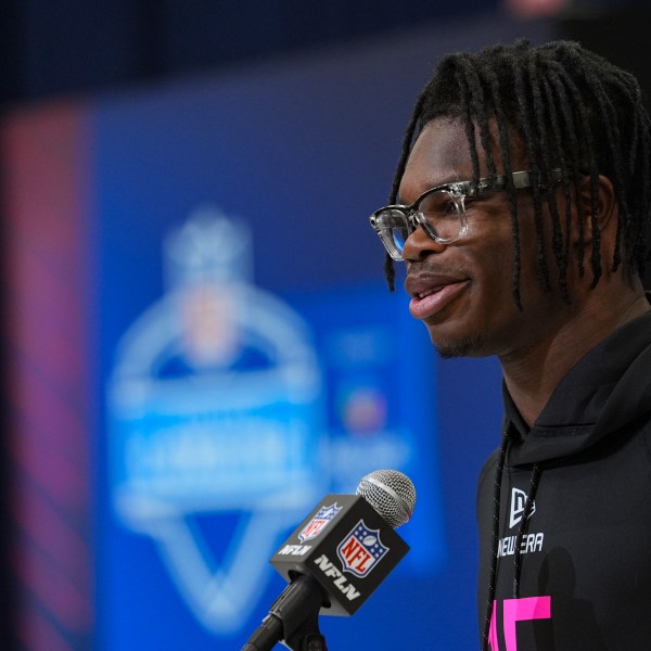 Colorado defensive back Travis Hunter speaks during a press conference at the NFL football scouting combine in Indianapolis, Thursday, Feb. 27, 2025. (AP Photo/Michael Conroy)