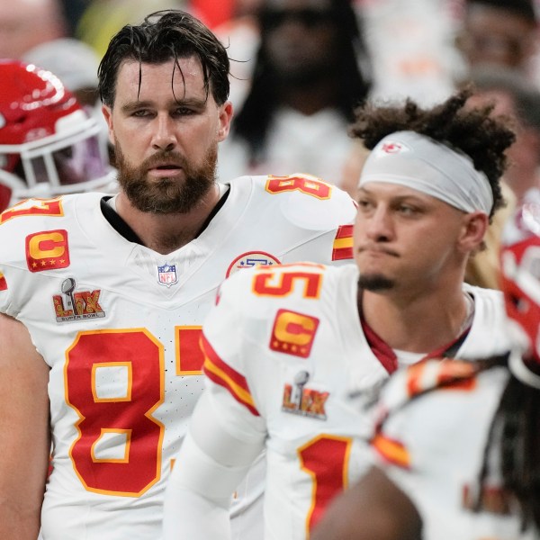 Kansas City Chiefs tight end Travis Kelce (87) quarterback Patrick Mahomes (15) and running back Kareem Hunt (29) walk off the field at the halftime break during the NFL Super Bowl 59 football game against the Philadelphia Eagles, Sunday, Feb. 9, 2025, in New Orleans. (AP Photo/Stephanie Scarbrough)