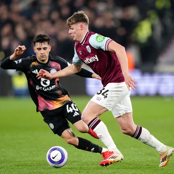 West Ham United's Evan Ferguson, right, and Leicester City's Facundo Buonanotte in action during the English Premier League soccer match between West Ham United and Leicester City at the London Stadium, London, Thursday Feb. 27, 2025. (Zac Goodwin/PA via AP)