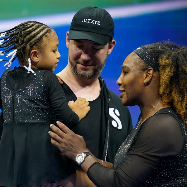 FILE - Serena Williams, of the United States, talks with her daughter Olympia and husband Alexis Ohanian after defeating Danka Kovinic, of Montenegro, during the first round of the U.S. Open tennis championships, Aug. 29, 2022, in New York. (AP Photo/Charles Krupa, File)