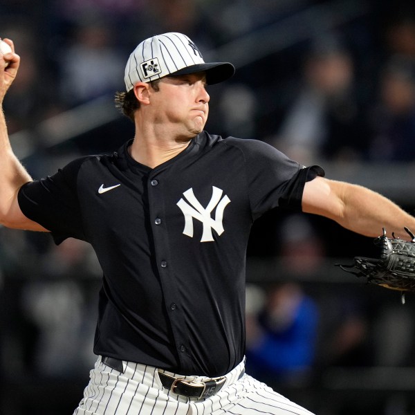 New York Yankees' Gerrit Cole pitches to the Toronto Blue Jays during the first inning of a spring training baseball game Friday, Feb. 28, 2025, in Tampa, Fla. (AP Photo/Chris O'Meara)