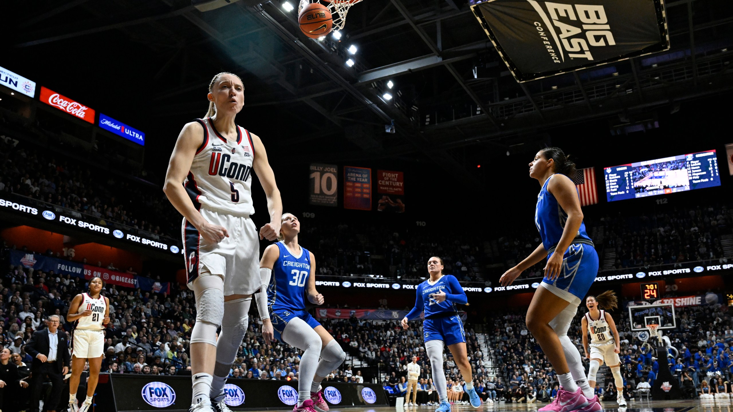 UConn guard Paige Bueckers (5) reacts after making a basket while being fouled during the second half of an NCAA college basketball game against Creighton in the finals of the Big East Conference tournament, Monday, March 10, 2025, in Uncasville, Conn. (AP Photo/Jessica Hill)