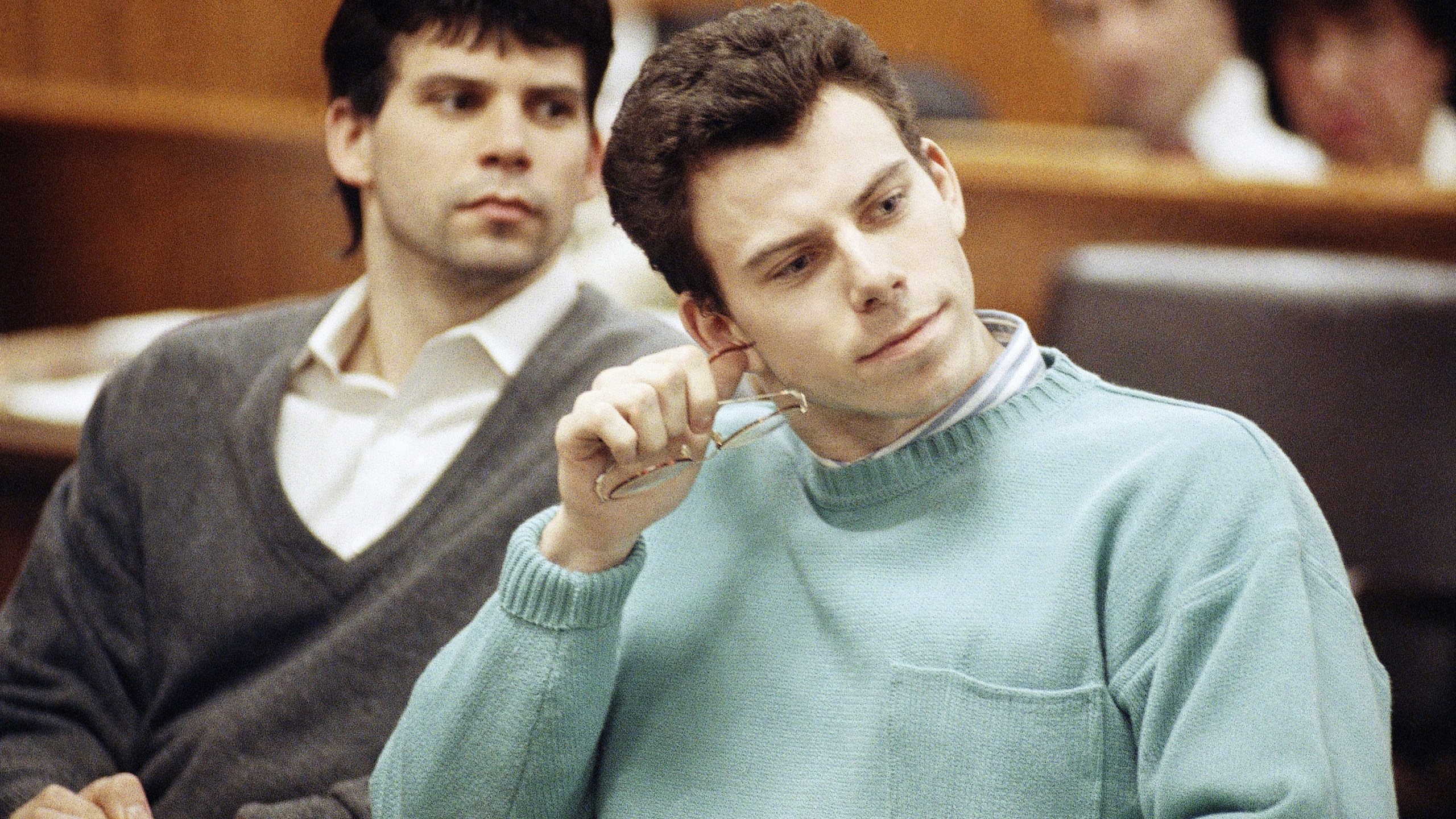 FILE - Lyle, left, and Erik Menendez appear in court for a preliminary hearing held in Beverly Hills, Calif., April 12, 1991. (AP Photo/Kevork Djansezian, File)